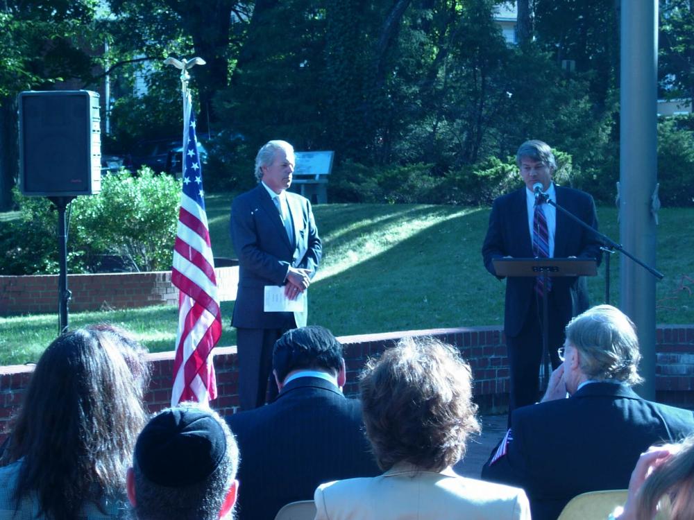Speakers at a ceremony